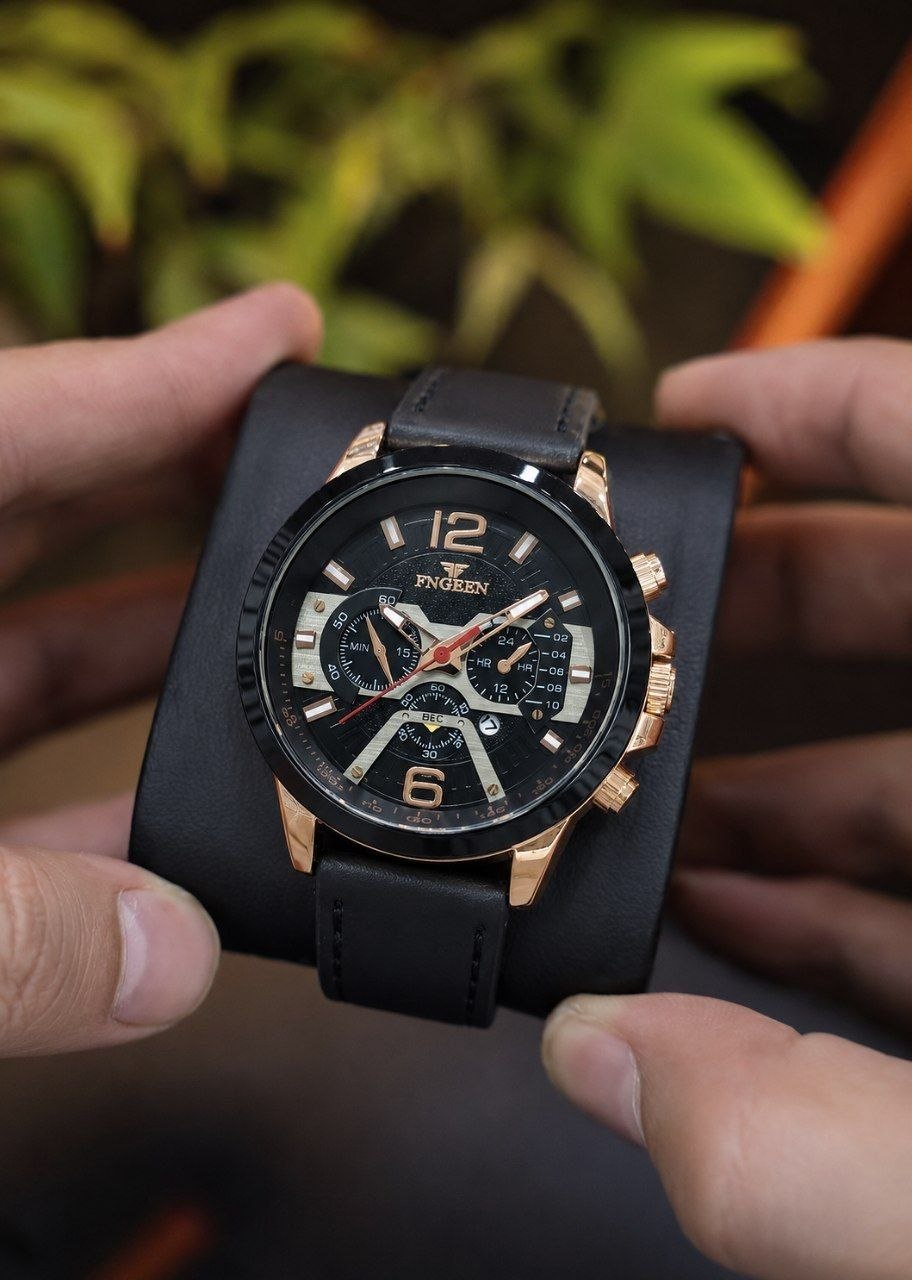 ساعت مچی مردانه ☑️FNGEEN  subset of BIN BOND       ⌚️برند شرکتی مردونه   مقاوم دربرابر آب  دارای روز شمار طرح کرنوگراف  بند چرمی  شب نما  رنگ ثابت  قفل کمربندی  موتور کوارتز