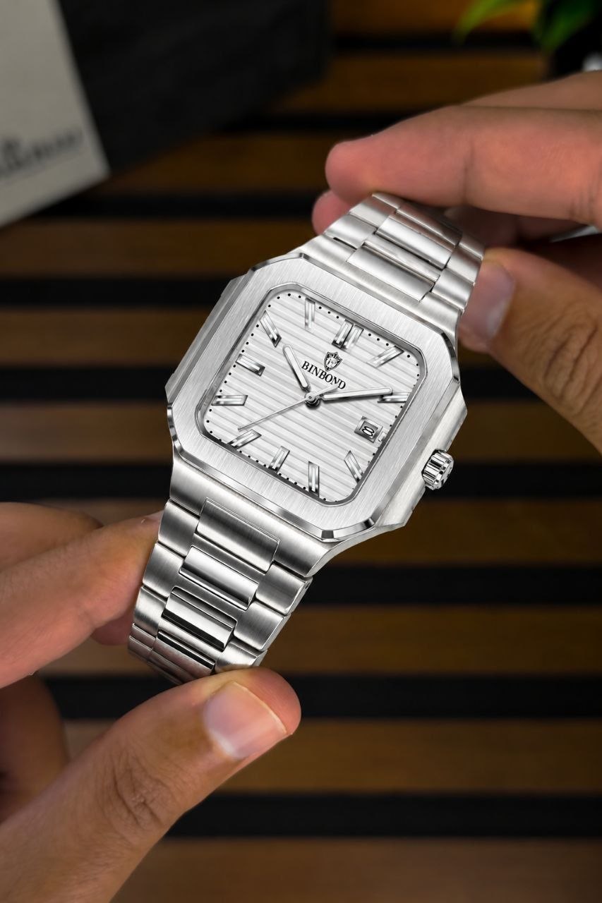 ساعت مردانه ☑️BIN BOND   《highe quality》       🫆Original watch               ⌚️بین باند مدلی نو  مناسب آقایان   مقاوم دربرابر آب برندشرکتی اوریجینال   دارای روز شمار  ضخامت ۱۱میل  قطر صفحه ۴۵میل بند استیل فولاد شیشه سافایر  شب نما قفل دو پروانه  موتور کوارتز   موجود در چهار رنگ پرطرفدار