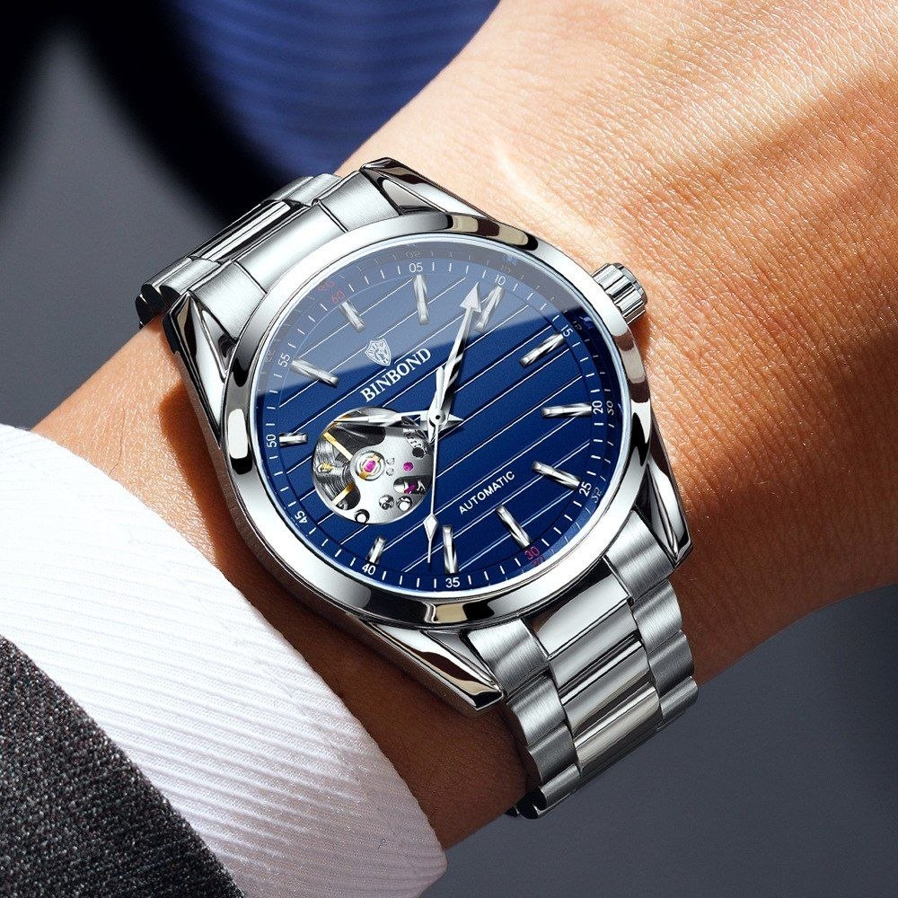 ساعت مچی مردانه ☑️BIN BOND   《highe quality》       🫆Original watch               ⌚️بین باند مدلی نو  مناسب آقایان  سبک تجاری موتور اتوماتیک  مقاوم دربرابر آب برندشرکتی اوریجینال  پشت قاب نمایشگر موتور   ضخامت ۱۴میل  قطر صفحه ۴۳میل بند استیل فولاد شیشه سافایر  شب نما قفل دو پروانه